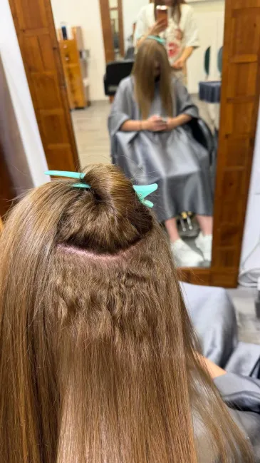 Before photo of textured hair prior to straightening