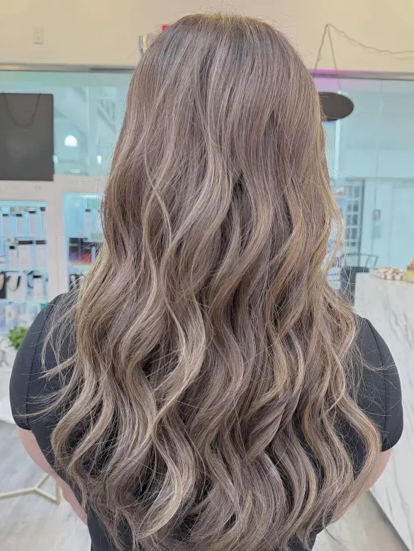 Specialty balayage with soft dimensional blonde tones